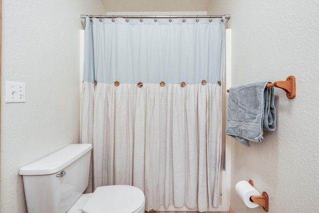 30 Knapp Ln, Kalispell, MT 59901 - bathroom featuring toilet and curtained shower
