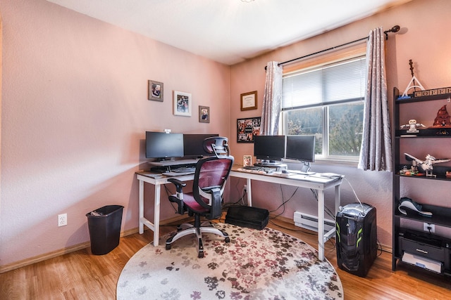 30 Knapp Ln, Kalispell, MT 59901 - office with baseboard heating, wood finished floors, and baseboards