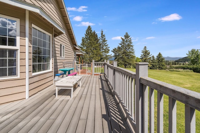 30 Knapp Ln, Kalispell, MT 59901 - wooden deck with a yard