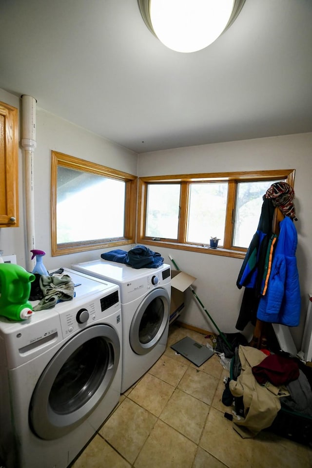 312 12th Ave N, Shelby, MT 59474 - washroom featuring washing machine and dryer and light tile patterned floors