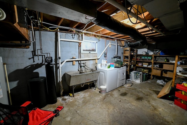 312 12th Ave N, Shelby, MT 59474 - unfinished below grade area with independent washer and dryer, a sink, and a water softener