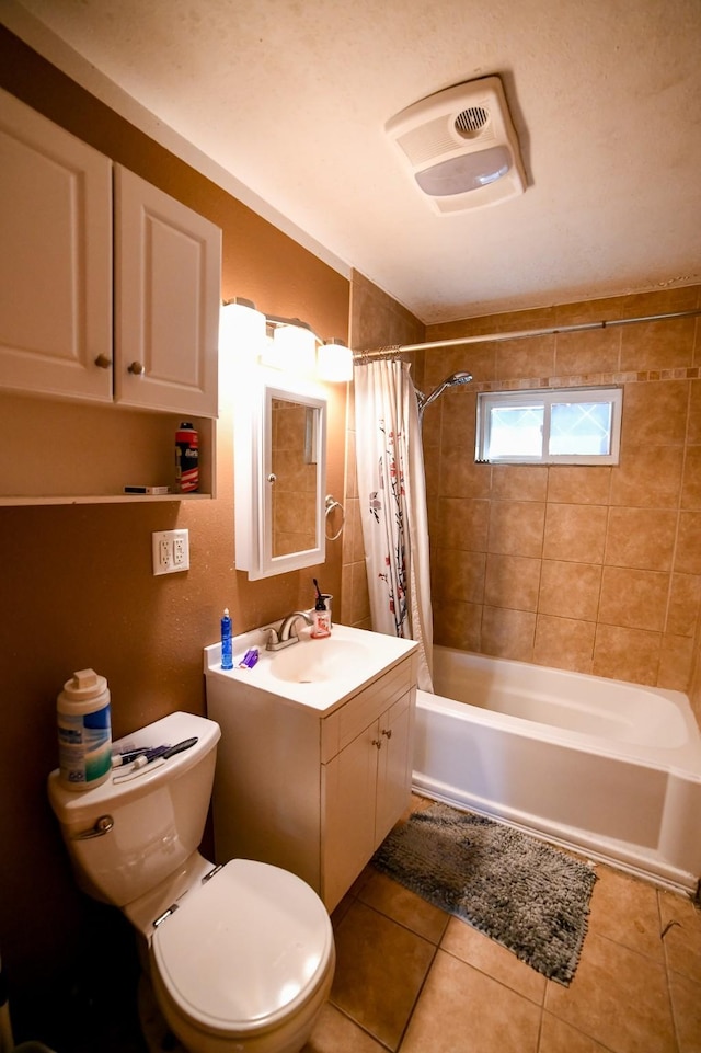 312 12th Ave N, Shelby, MT 59474 - full bath with tile patterned flooring, toilet, vanity, and shower / tub combo