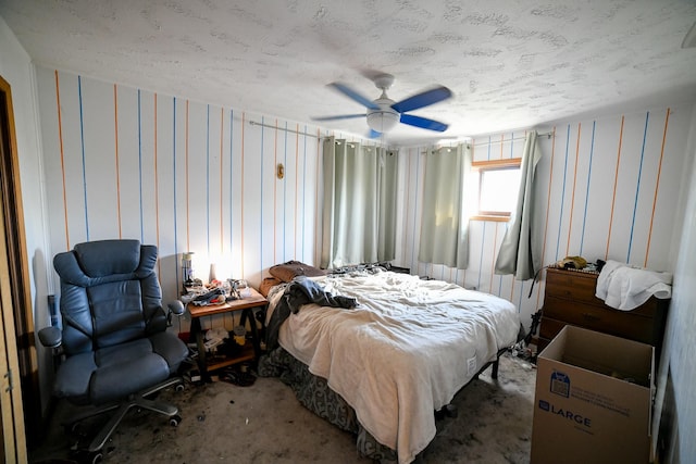 312 12th Ave N, Shelby, MT 59474 - carpeted bedroom featuring ceiling fan and a textured ceiling