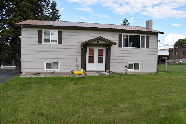 83 Indian Head Rd, Libby, MT 59923 - raised ranch with a chimney and metal roof