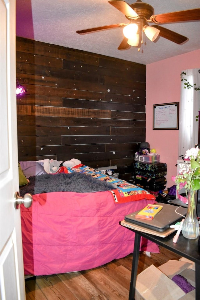 83 Indian Head Rd, Libby, MT 59923 - bedroom featuring wood finished floors and a ceiling fan