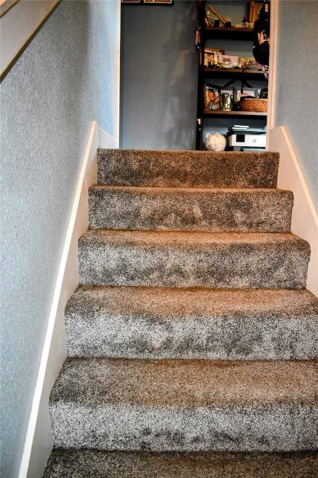 83 Indian Head Rd, Libby, MT 59923 - stairway featuring a textured wall