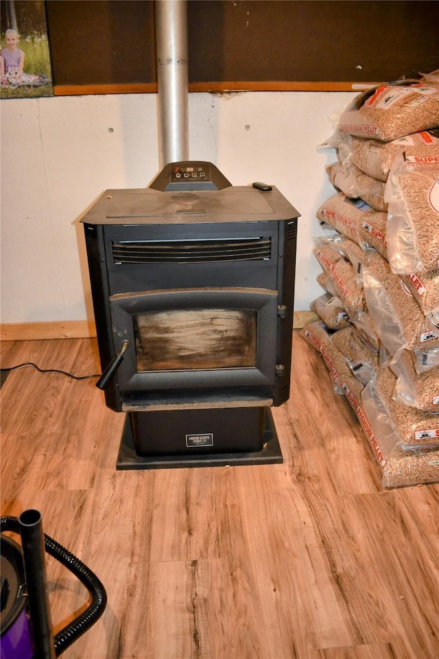 83 Indian Head Rd, Libby, MT 59923 - detailed view of a wood stove and wood finished floors
