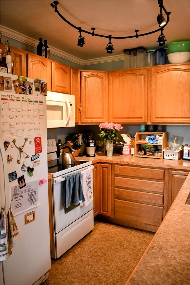 83 Indian Head Rd, Libby, MT 59923 - kitchen with white appliances, crown molding, and light countertops