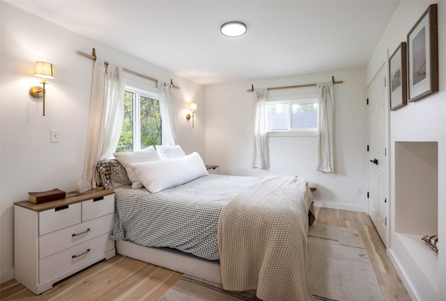 215 Tower St, Missoula, MT 59804 - bedroom featuring light wood-style flooring and baseboards