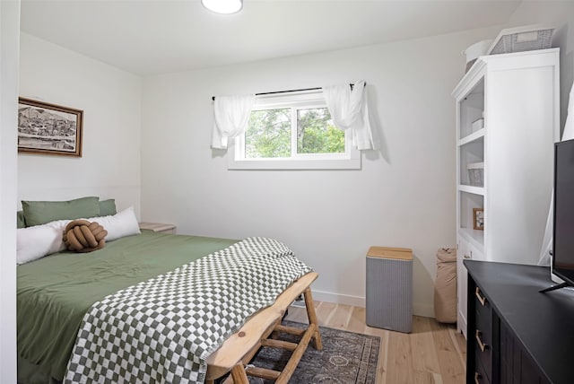 215 Tower St, Missoula, MT 59804 - bedroom with light wood-style flooring and baseboards