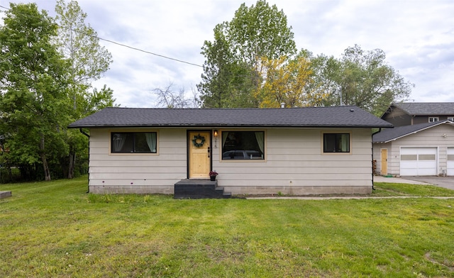 215 Tower St, Missoula, MT 59804 - view of front of property with a front yard and an outbuilding