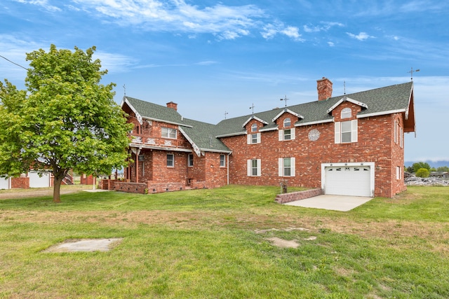 33562 Fox Rd, Polson, MT 59860 - view of front facade featuring brick siding, a chimney, an attached garage, and roof with shingles