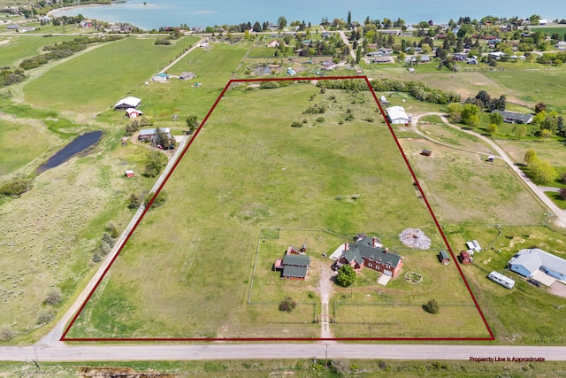 33562 Fox Rd, Polson, MT 59860 - aerial view of property's location featuring property boundaries highlighted and a nearby body of water