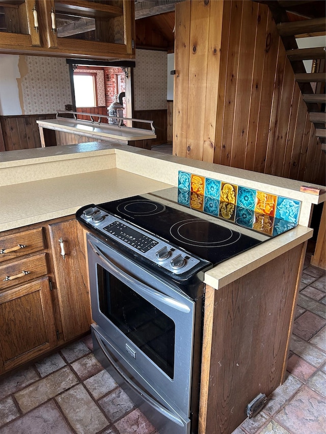 33562 Fox Rd, Polson, MT 59860 - kitchen featuring electric stove, stone tile floors, and light countertops