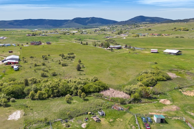 33562 Fox Rd, Polson, MT 59860 - view of property location featuring rural landscape, a mountain backdrop, and a pastoral area