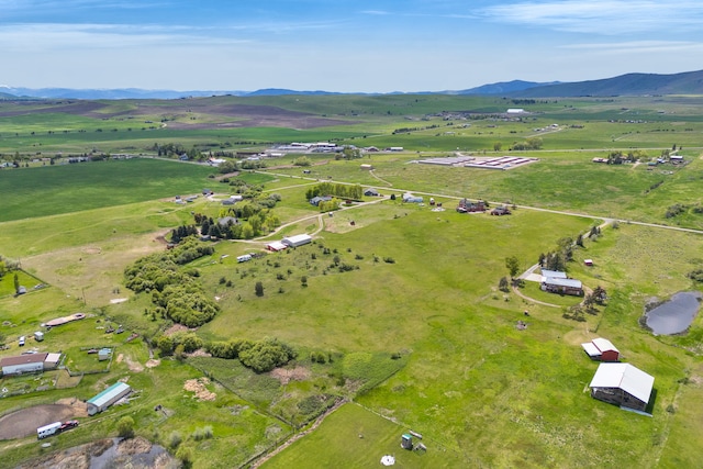 33562 Fox Rd, Polson, MT 59860 - aerial view of property and surrounding area featuring rural landscape, mountains, and agricultural land