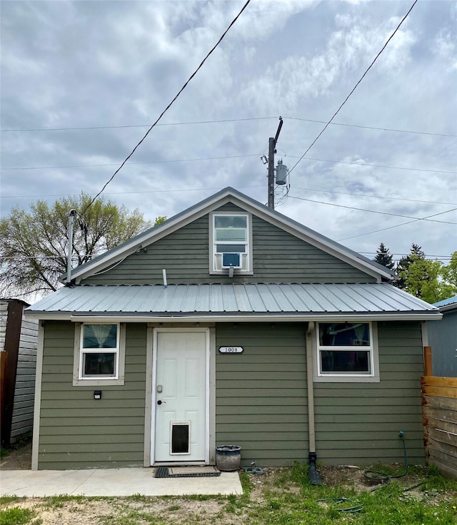 1008 4th Ave S, Great Falls, MT 59405 - rear view of property with metal roof and cooling unit