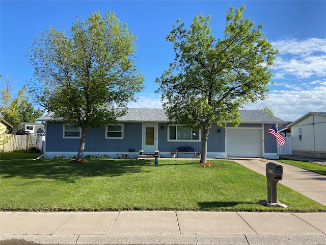 4239 7th Ave N, Great Falls, MT 59405 - view of front of house featuring a garage and driveway
