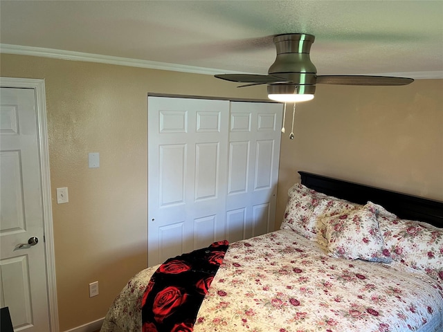 4239 7th Ave N, Great Falls, MT 59405 - bedroom with crown molding, a closet, a ceiling fan, and baseboards