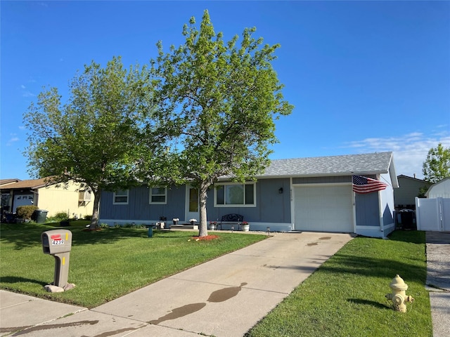 4239 7th Ave N, Great Falls, MT 59405 - view of front of house with a garage and concrete driveway