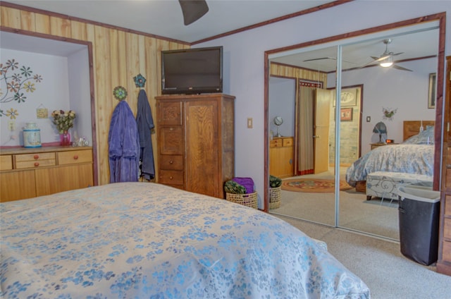 8229 York Rd, Helena, MT 59602 - carpeted bedroom featuring crown molding, ceiling fan, and a closet