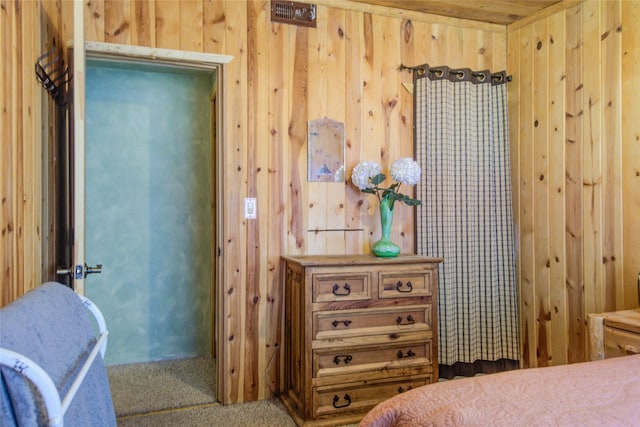 8229 York Rd, Helena, MT 59602 - bedroom with wooden walls and carpet