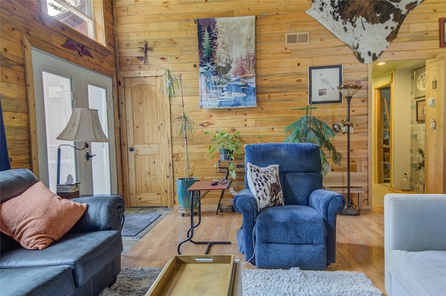8229 York Rd, Helena, MT 59602 - living room with wooden walls, wood finished floors, and a towering ceiling
