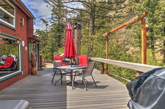 8229 York Rd, Helena, MT 59602 - wooden terrace featuring outdoor dining space