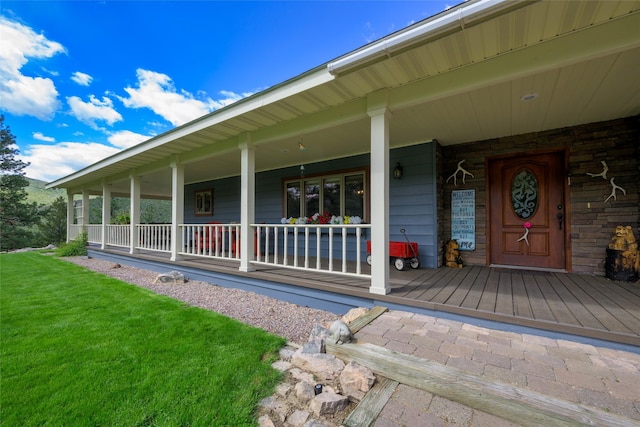 5380 US Highway 93, Conner, MT 59827 - view of exterior entry with a porch and a lawn