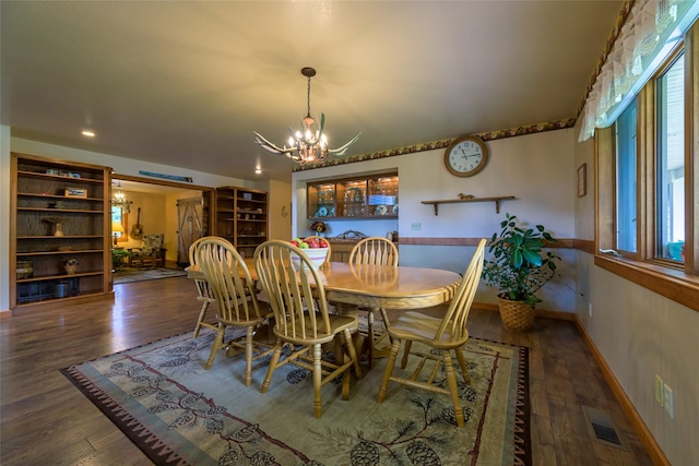5380 US Highway 93, Conner, MT 59827 - dining space with a chandelier, wood finished floors, baseboards, and recessed lighting