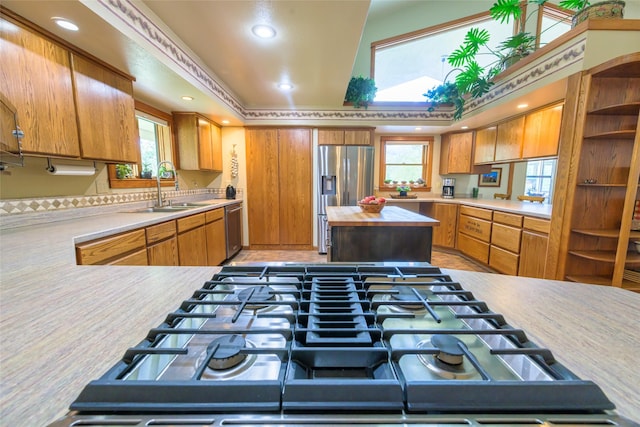 5380 US Highway 93, Conner, MT 59827 - kitchen featuring stainless steel appliances, plenty of natural light, a sink, brown cabinets, and recessed lighting