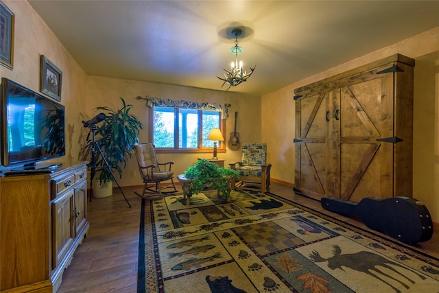 5380 US Highway 93, Conner, MT 59827 - living area featuring dark wood finished floors, baseboards, and a chandelier