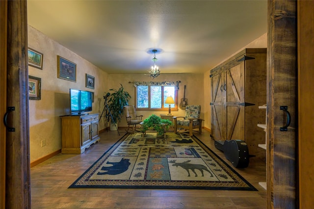 5380 US Highway 93, Conner, MT 59827 - dining space featuring hardwood / wood-style floors, a chandelier, and baseboards