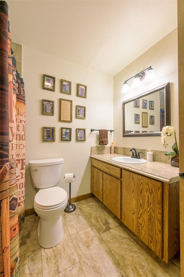 5380 US Highway 93, Conner, MT 59827 - full bathroom with vanity, toilet, and baseboards