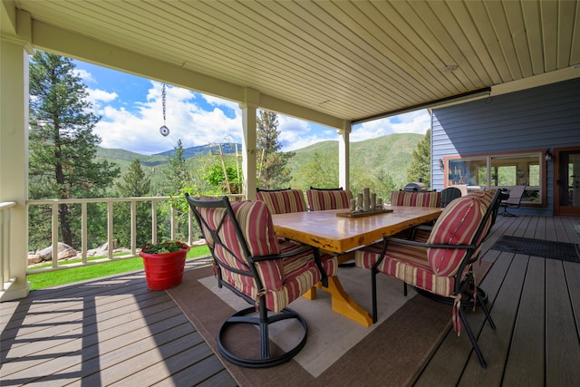 5380 US Highway 93, Conner, MT 59827 - wooden deck featuring a mountain view and outdoor dining space