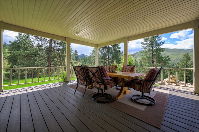 5380 US Highway 93, Conner, MT 59827 - wooden terrace with a mountain view and outdoor dining space