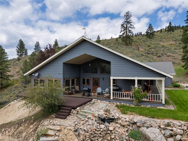 5380 US Highway 93, Conner, MT 59827 - back of house with a fire pit and a deck