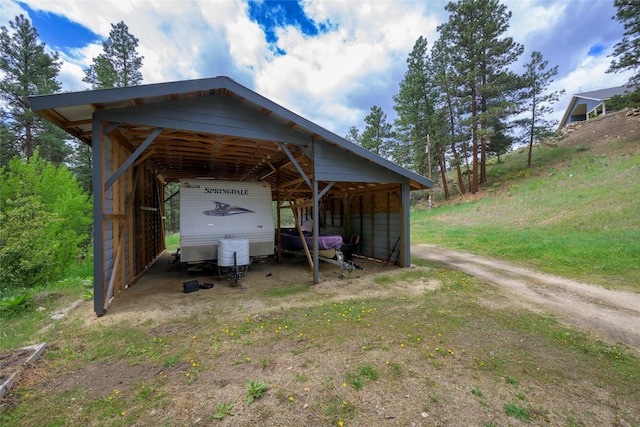 5380 US Highway 93, Conner, MT 59827 - view of parking / parking lot with a detached carport, a pole building, and driveway