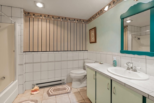 30 Panoramic Dr, Kalispell, MT 59901 - bathroom with a baseboard radiator, tile walls, vanity, and tile patterned floors