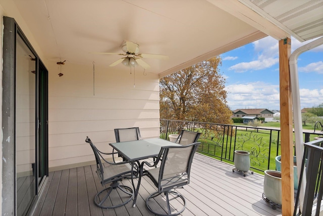 30 Panoramic Dr, Kalispell, MT 59901 - wooden terrace featuring a ceiling fan, a yard, and outdoor dining area