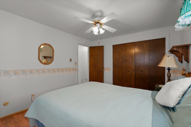 30 Panoramic Dr, Kalispell, MT 59901 - bedroom with a closet, wood finished floors, and ceiling fan