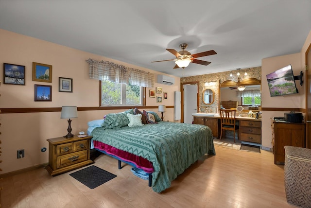 30 Panoramic Dr, Kalispell, MT 59901 - bedroom with an AC wall unit and light wood-style floors