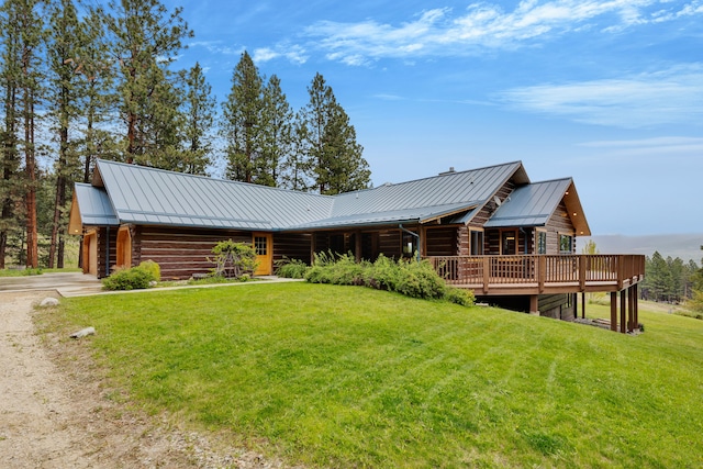 629 Alvista Loop, Hamilton, MT 59840 - back of property featuring dirt driveway, a lawn, a standing seam roof, and log exterior