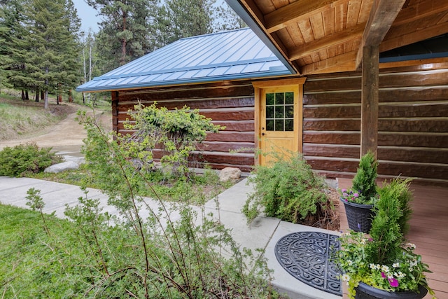629 Alvista Loop, Hamilton, MT 59840 - view of side of property with log exterior, metal roof, and a standing seam roof