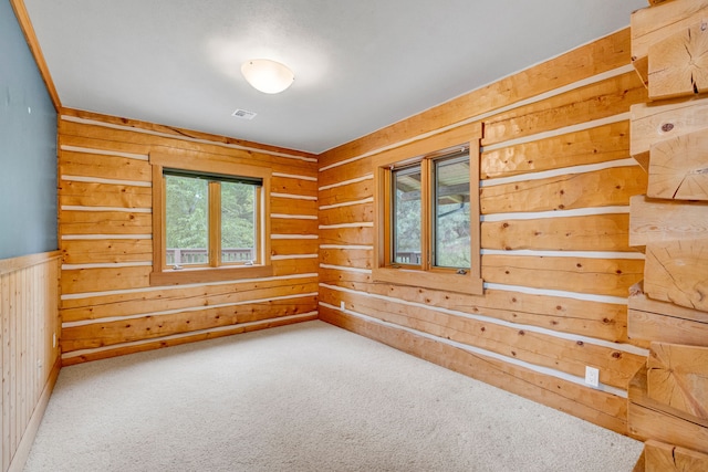629 Alvista Loop, Hamilton, MT 59840 - empty room featuring wooden walls and carpet