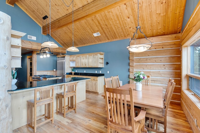 629 Alvista Loop, Hamilton, MT 59840 - dining area featuring wooden ceiling with exposed beams, light wood-style floors, and high vaulted ceiling