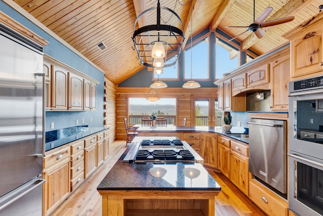 629 Alvista Loop, Hamilton, MT 59840 - kitchen featuring stainless steel appliances, wooden ceiling with exposed beams, light wood-style flooring, ceiling fan, and a center island