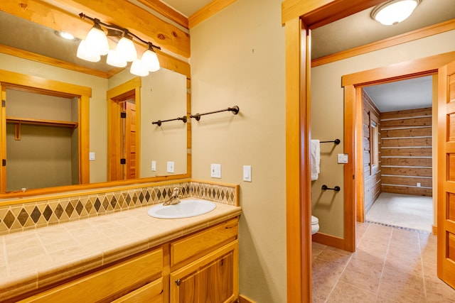 629 Alvista Loop, Hamilton, MT 59840 - bathroom with crown molding, vanity, toilet, tile patterned floors, and baseboards
