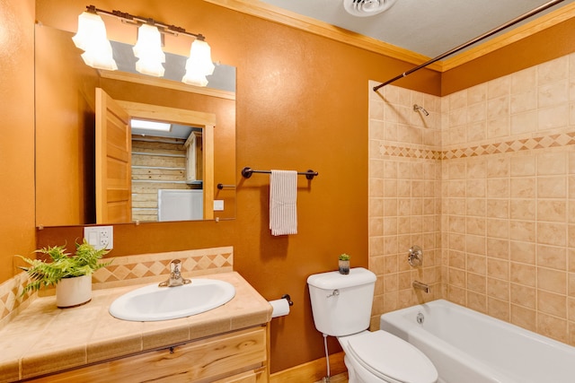 629 Alvista Loop, Hamilton, MT 59840 - bathroom featuring toilet, vanity, ornamental molding, shower / washtub combination, and baseboards