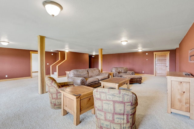 629 Alvista Loop, Hamilton, MT 59840 - living area featuring light colored carpet, baseboards, and stairway